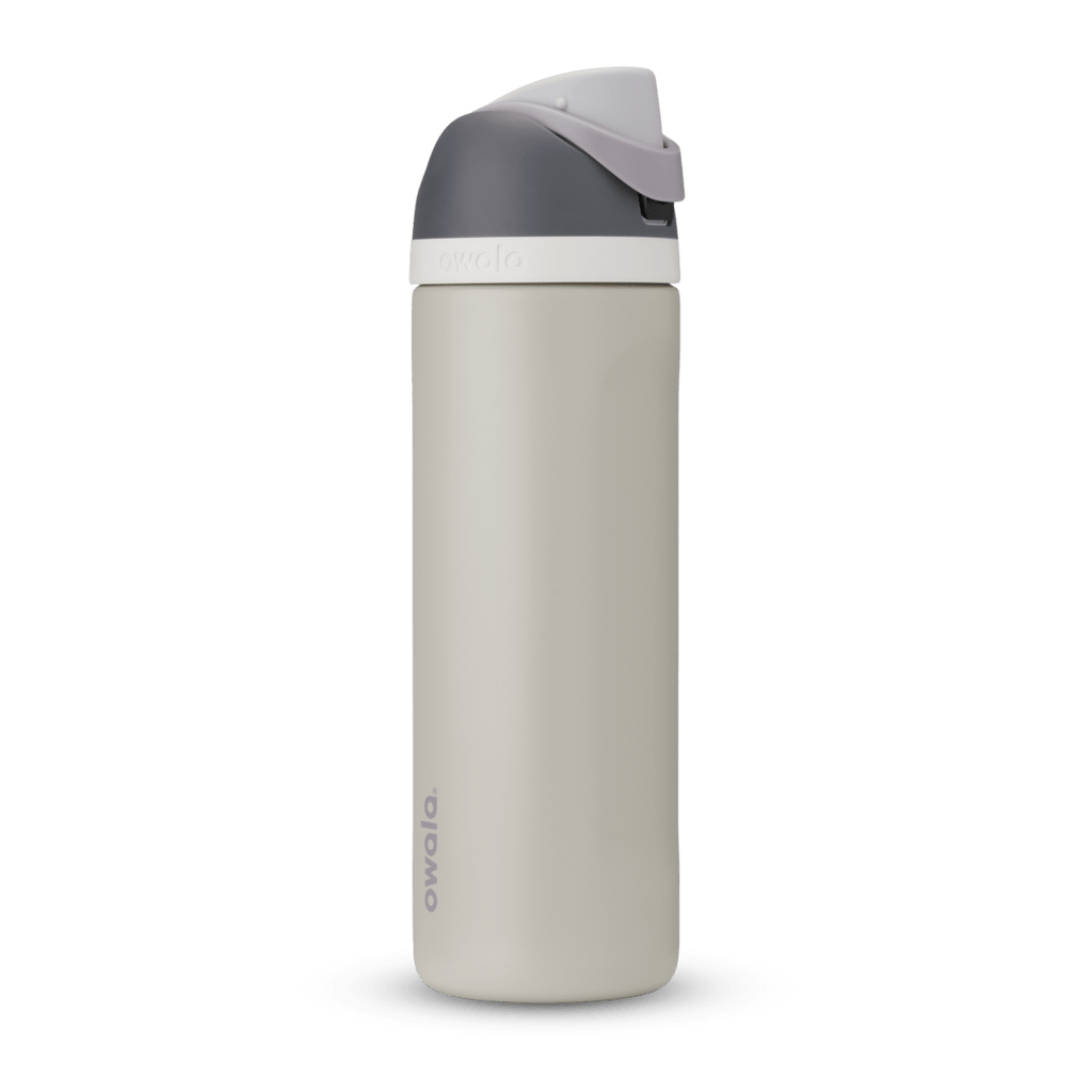 FreeSip 24oz in Rock On, cream stone body with dark grey flip cap, light grey carry loop, and white accent band