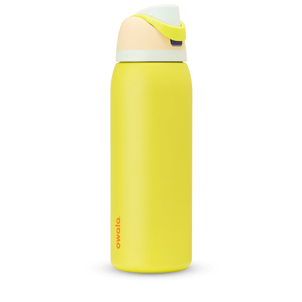 FreeSip 40oz in Lemon Limeade, bright yellow body with peach lid, neon yellow-green carry loop, white accent band, and orange logo